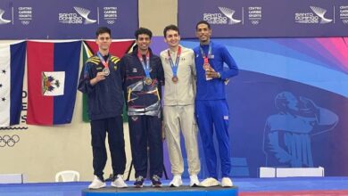 Pedraza (centro) se colgó una medalla dorada para Venezuela