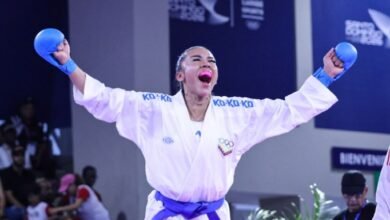La karateca venezolana Yorgelis Salazar grita de emoción y celebra con los brazos en alto tras ganar la medalla de oro en la categoría de los -50 kg de kumite en los Juegos Centroamericanos y del Caribe Santo Domingo 2026.